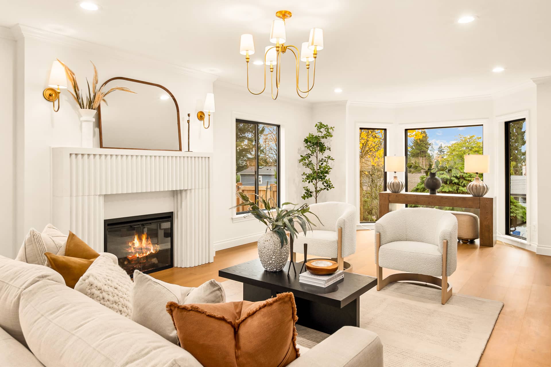 A warm, refined Seattle living room designed and built by Homes by V